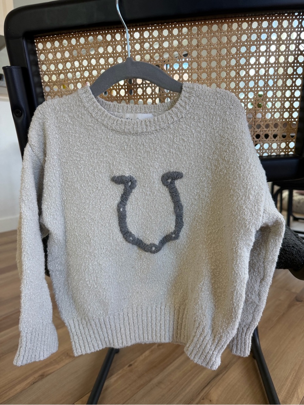 Rylee + Cru Cream Bouclé Sweater with Gray Horseshoe Detail
